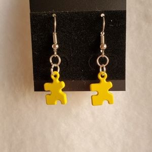 Womens yellow puzzle piece hook earrings